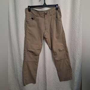 Men's Kuhl Radikl Casual Cargo Pants in Tan.